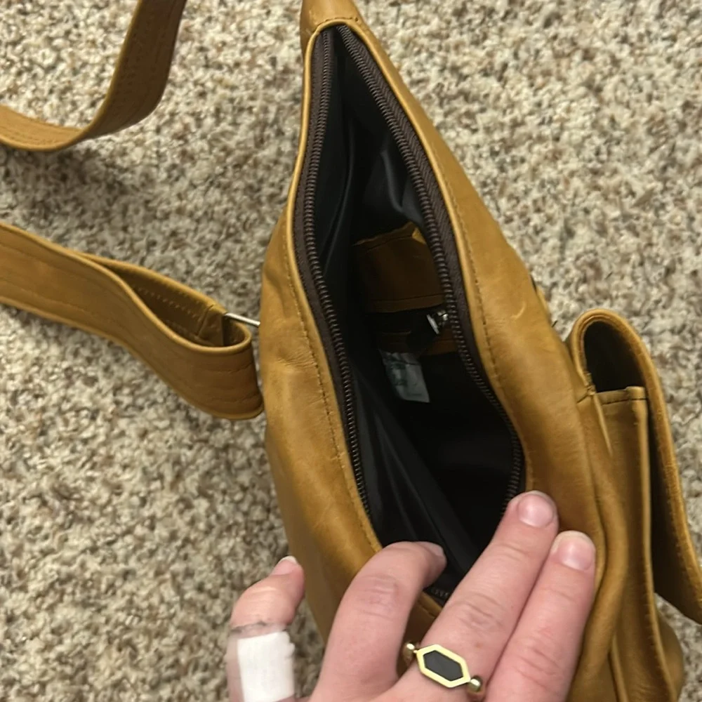 Genuine leather sling backpack